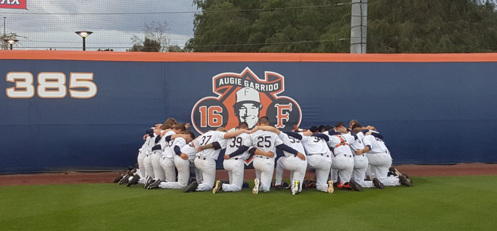 Titans huddle before Augie sign