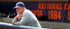 Cal State Fullerton baseball coach Rick Vanderhook watches the team run through drills at Cal State Fullerton's Goodwin Field.